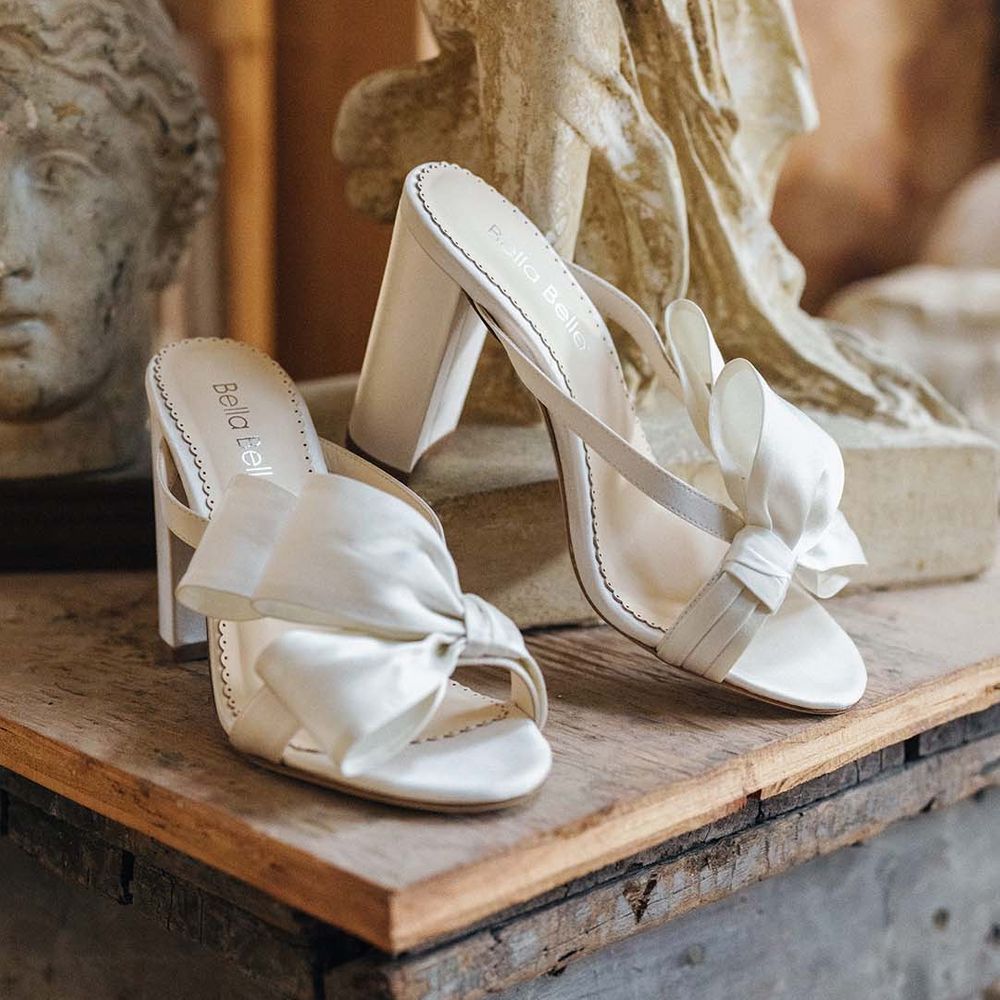 White wedding mules with block heel and half bow design 