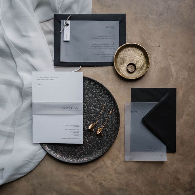Black wedding stationery suite flaylay