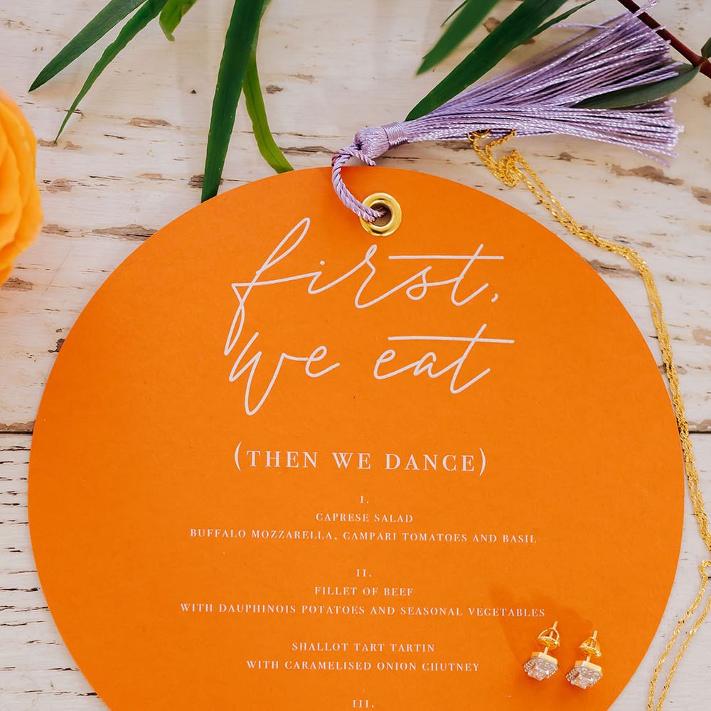 Orange circle wedding stationery menu car with lavender tassel 