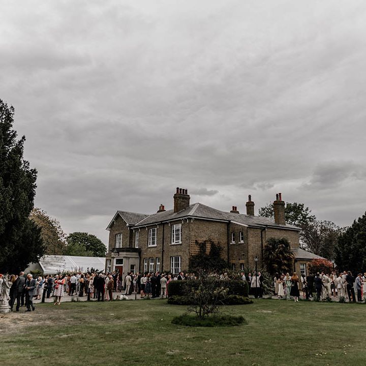 Back garden wedding with clear marquee at the bride's parent's home 