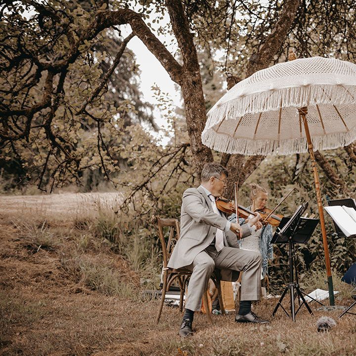 The string quartet plays during the wedding ceremony 