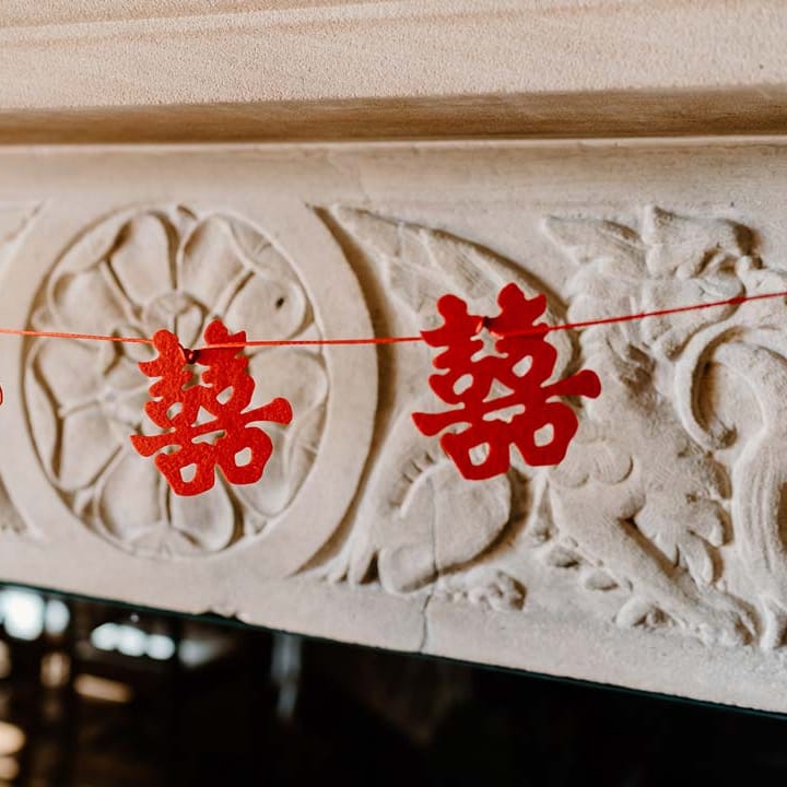 Red Chinese wedding decorations at Broadfield Court wedding venue