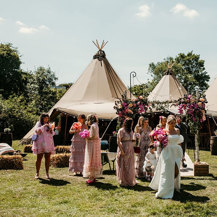 Tipi wedding venue in Northamptonshire decorated with pink wedding flowers 