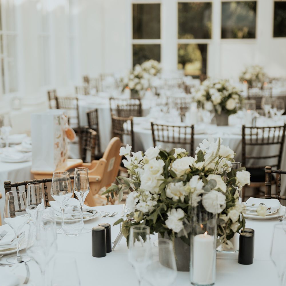 white centrepiece flowers at Gunnersbury park wedding venue 