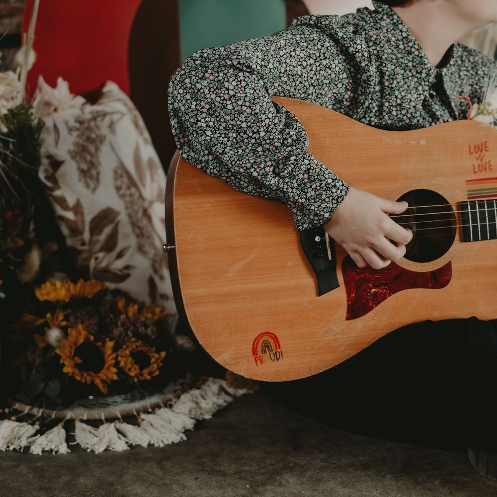 Guitar with love is love inscription