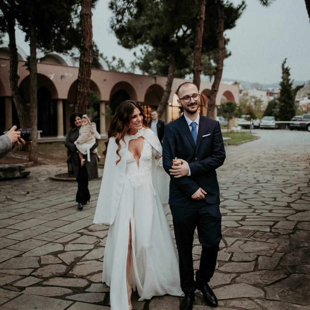 The bride being escorted to her church wedding ceremony