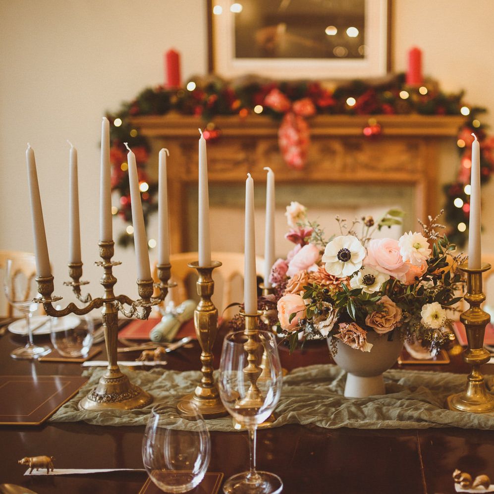 Intimate wedding table decor with floral centrepiece, candelabra and candlesticks 