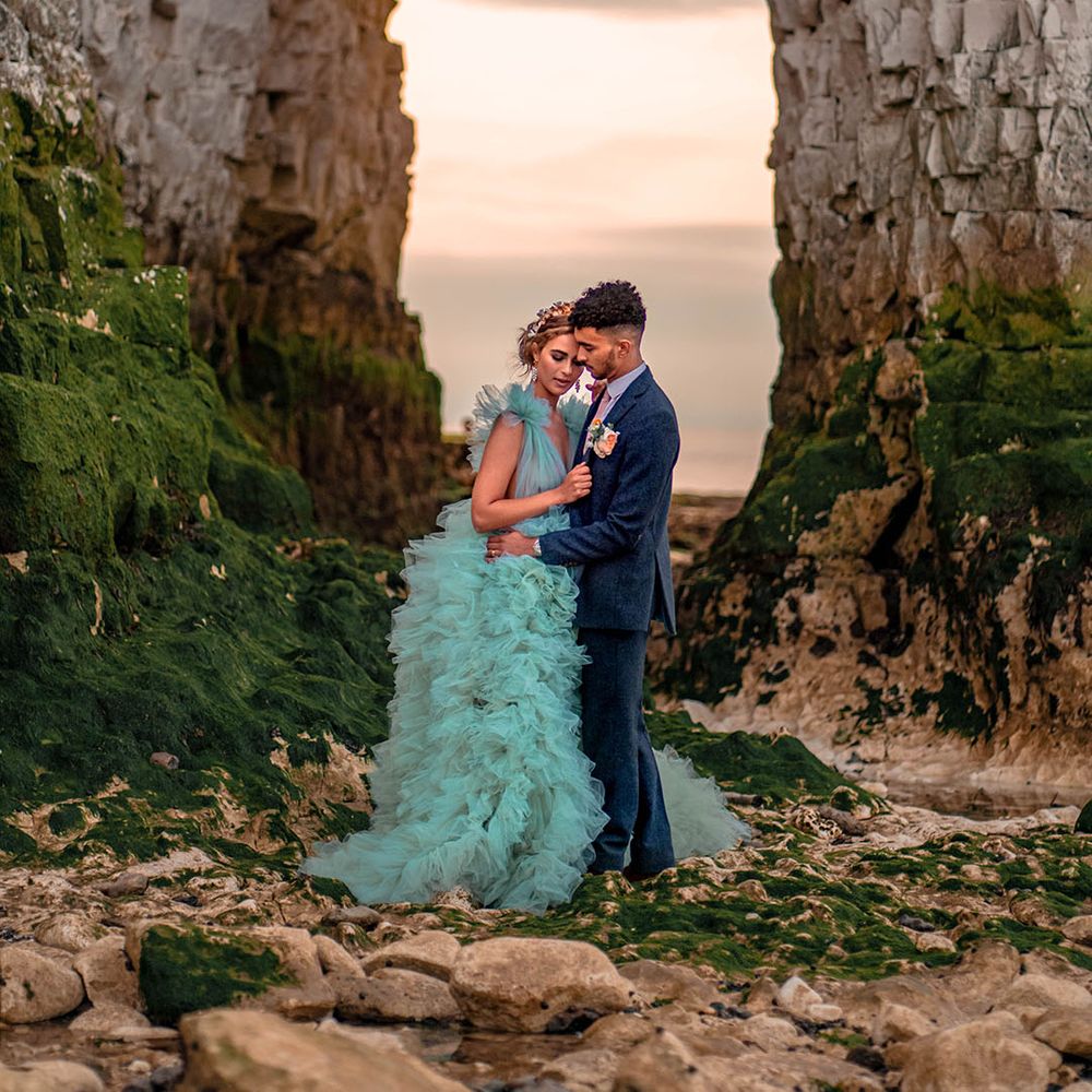 Botany Bay Kent wedding inspiration with bride in a mint green wedding dress