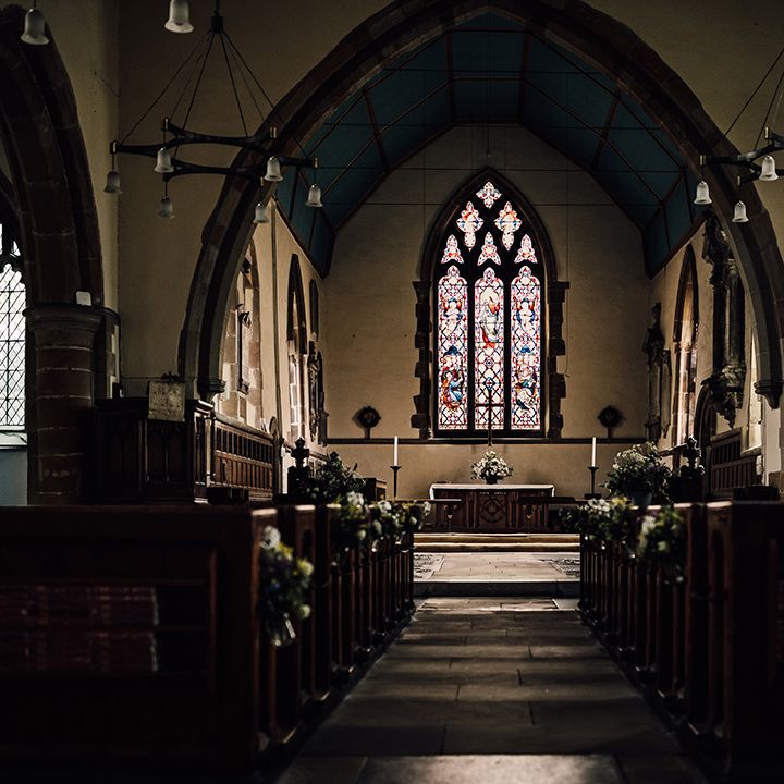 Church where the bride and groom get married with stained glass windows 