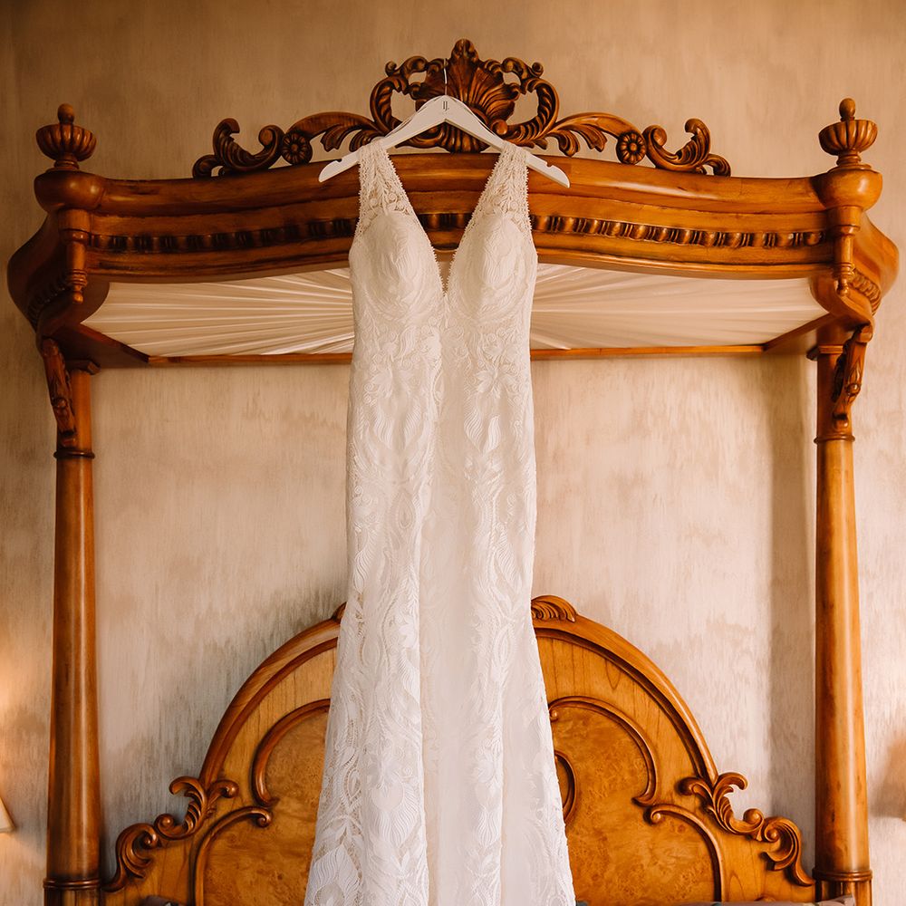 Sparkly sandal wedding shoes and white lace wedding dress with train 