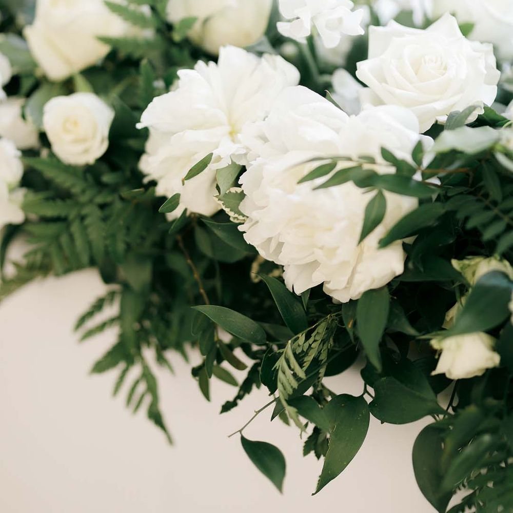 green foliage and white flower wedding arrangements 