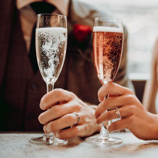 Champagne toast after intimate micro wedding ceremony 