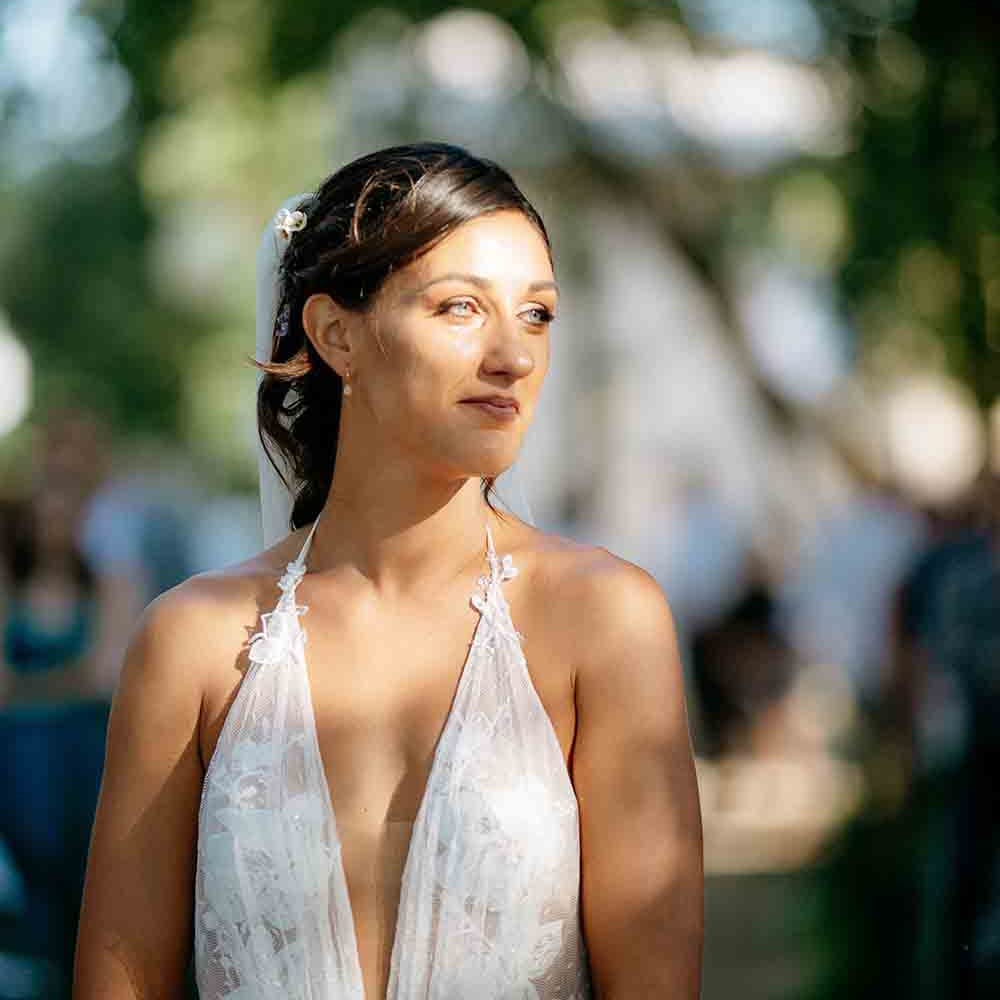 Beautiful bride in plunging gown 