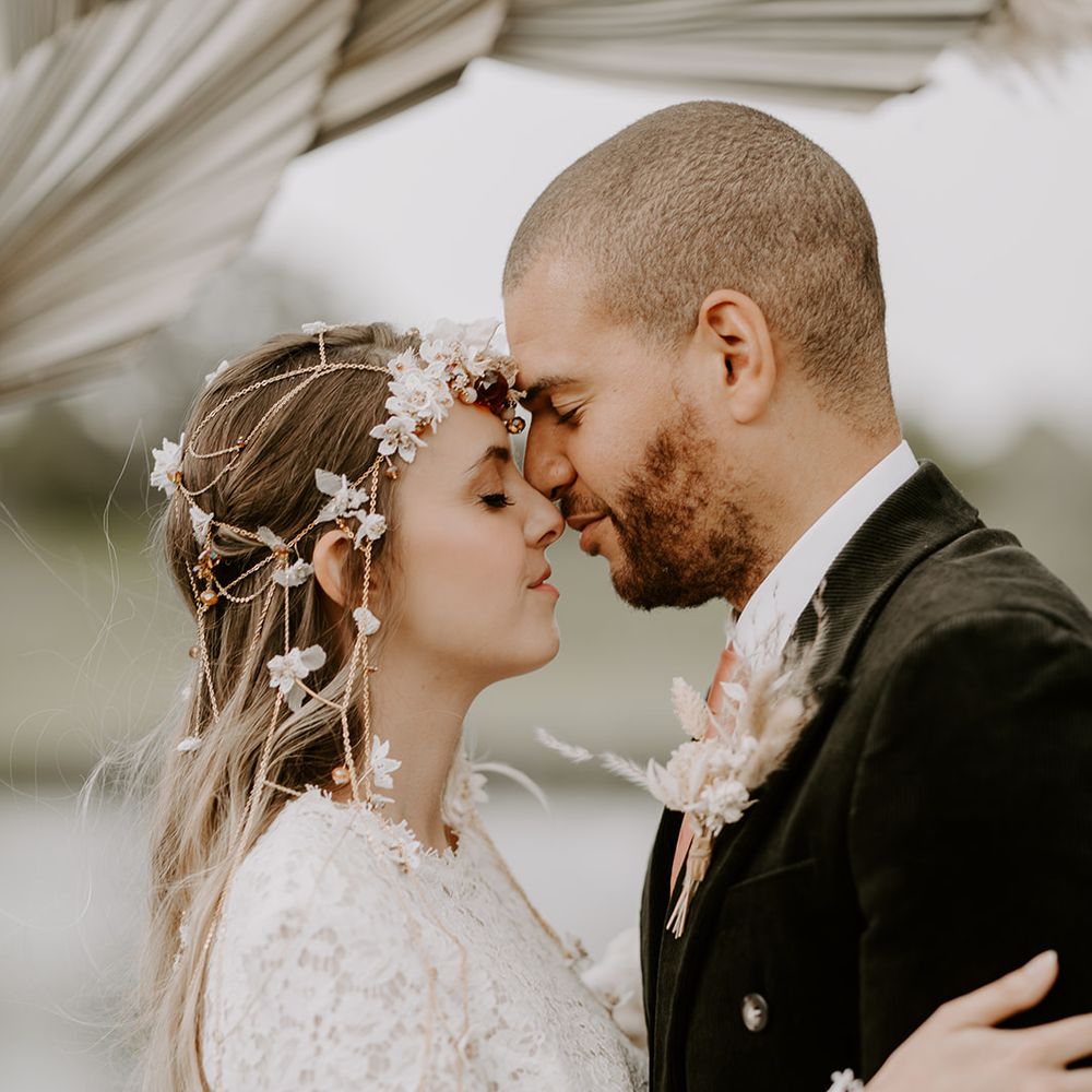 Intimate bride and groom portrait with bride in a boho chain headdress 