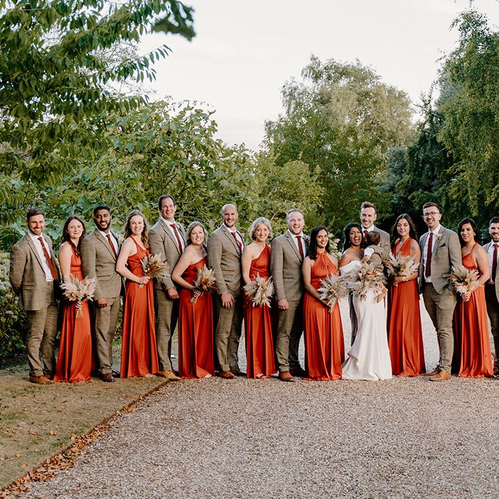 Large wedding party photo with twenty bridesmaids and groomsmen 
