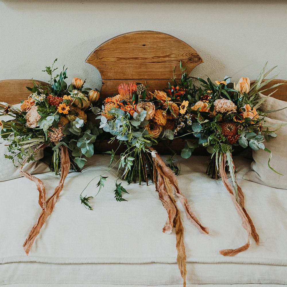 Orange and green wedding bouquets 