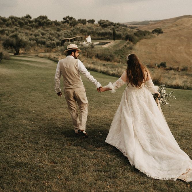Bride and Groom roam the Tuscany countryside at The Lazy Olive