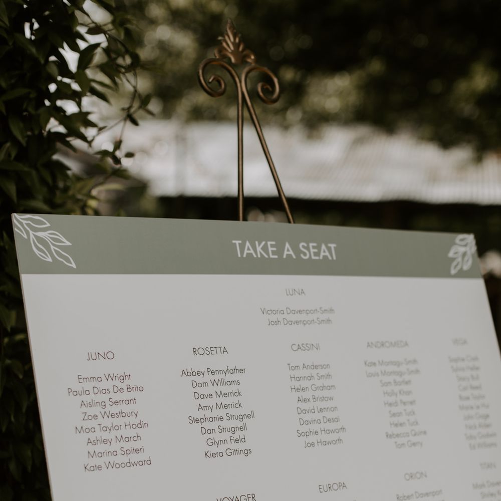 Wedding seating chart with sage green accent colour