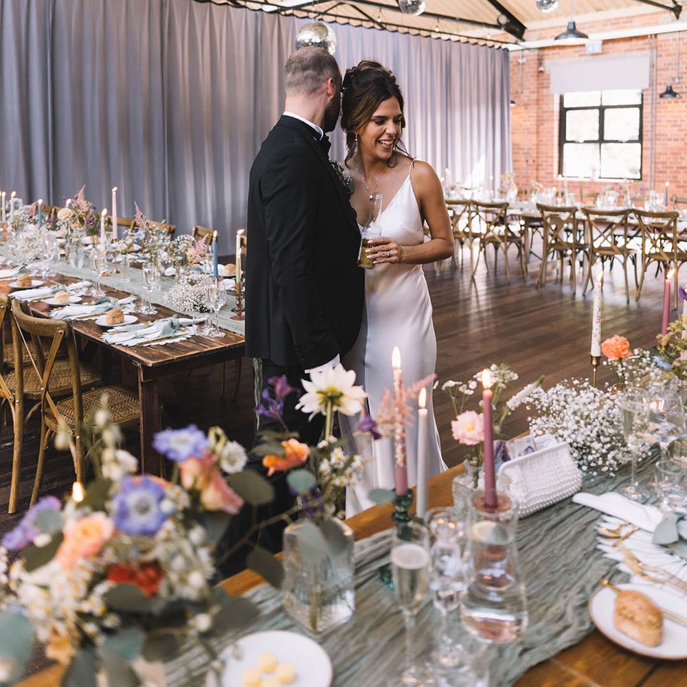 Bowers Mill, The Venue in Halifax Yorkshire wedding venue with the bride and groom in black tie dress code 