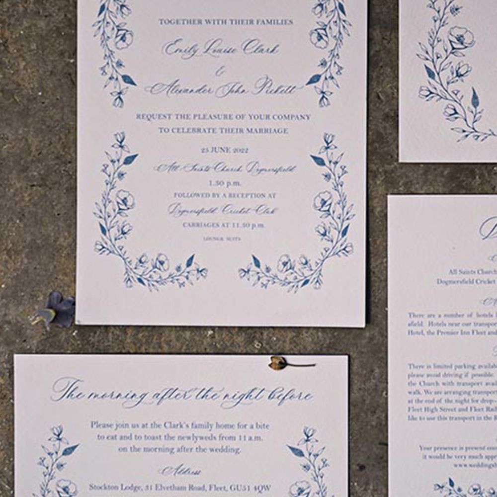 Classic blue and white wedding stationery with floral design 