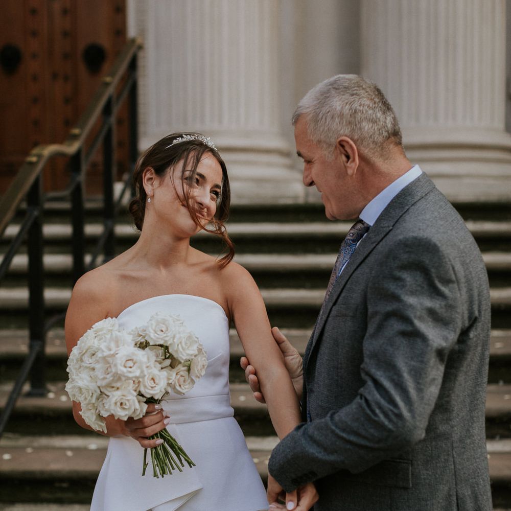 Bride and groom at intimate town hall wedding