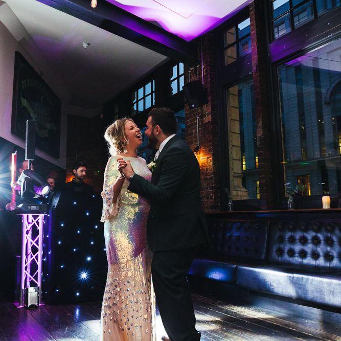 Bride & groom have their first dance together