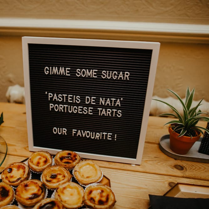 Dessert table with barber board wedding sign 