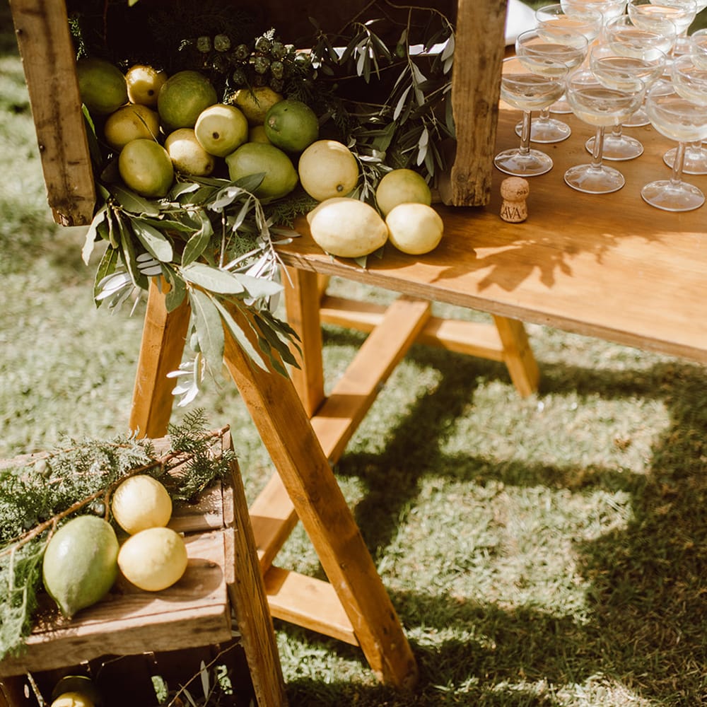 Box of lemons with drinks for the guests 