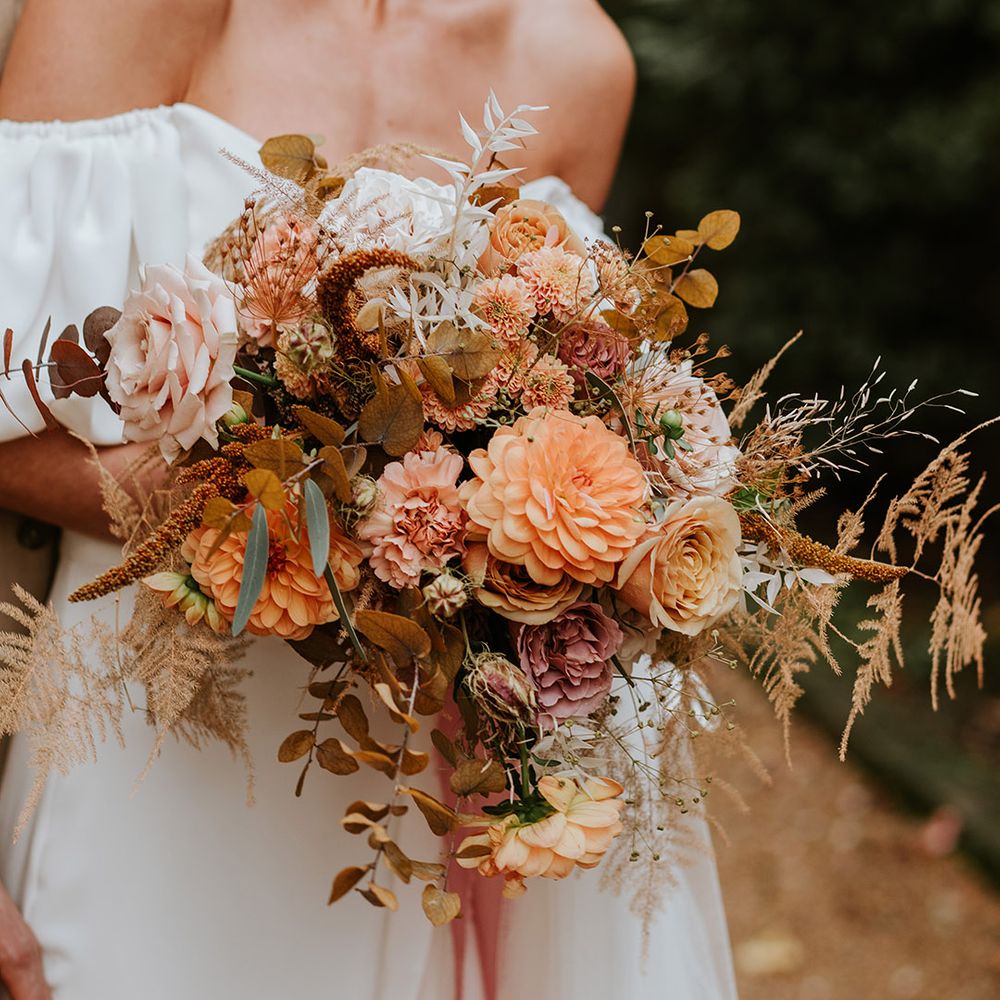 Toffee, beige and rust coloured wedding bouquet wirh fresh and dried flowers