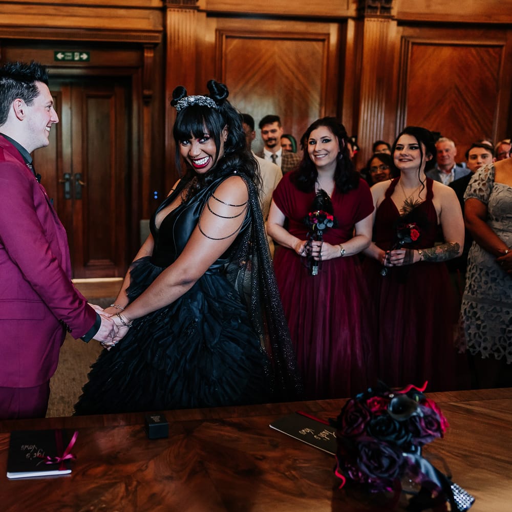 Bride & groom during wedding ceremony at The Old Marylebone Town Hall 