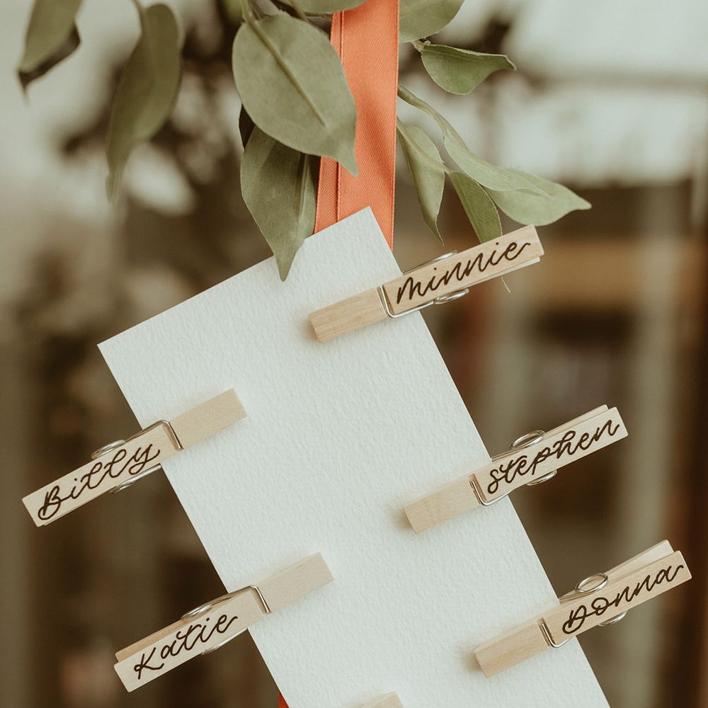 Peg wedding table plan by recommended supplier, Bewilderly for bouncy castle wedding 