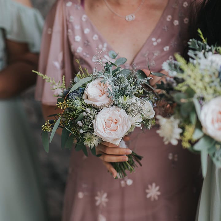 small bridesmaid bouquet with pink roses and thistles 