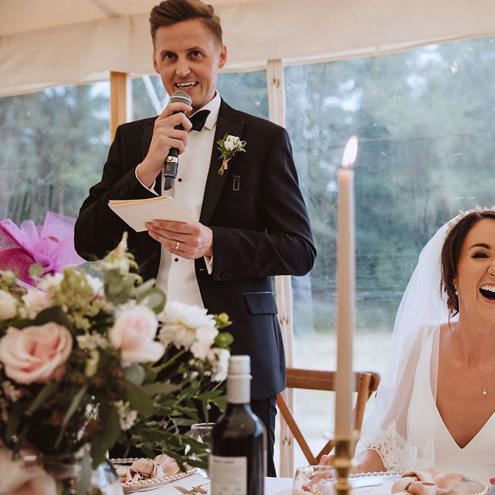 Groom speech at marquee wedding read out as the bride laughs 