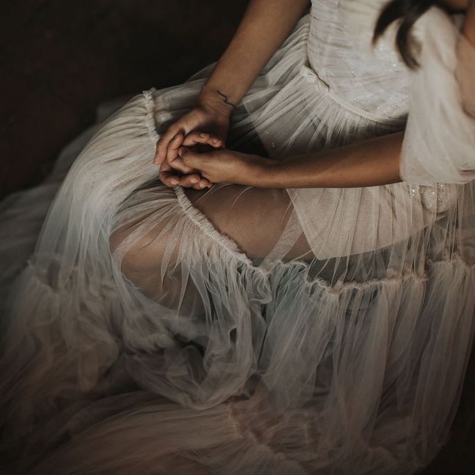 Berta Bridal wedding dress with short hem under a layer of tulle 