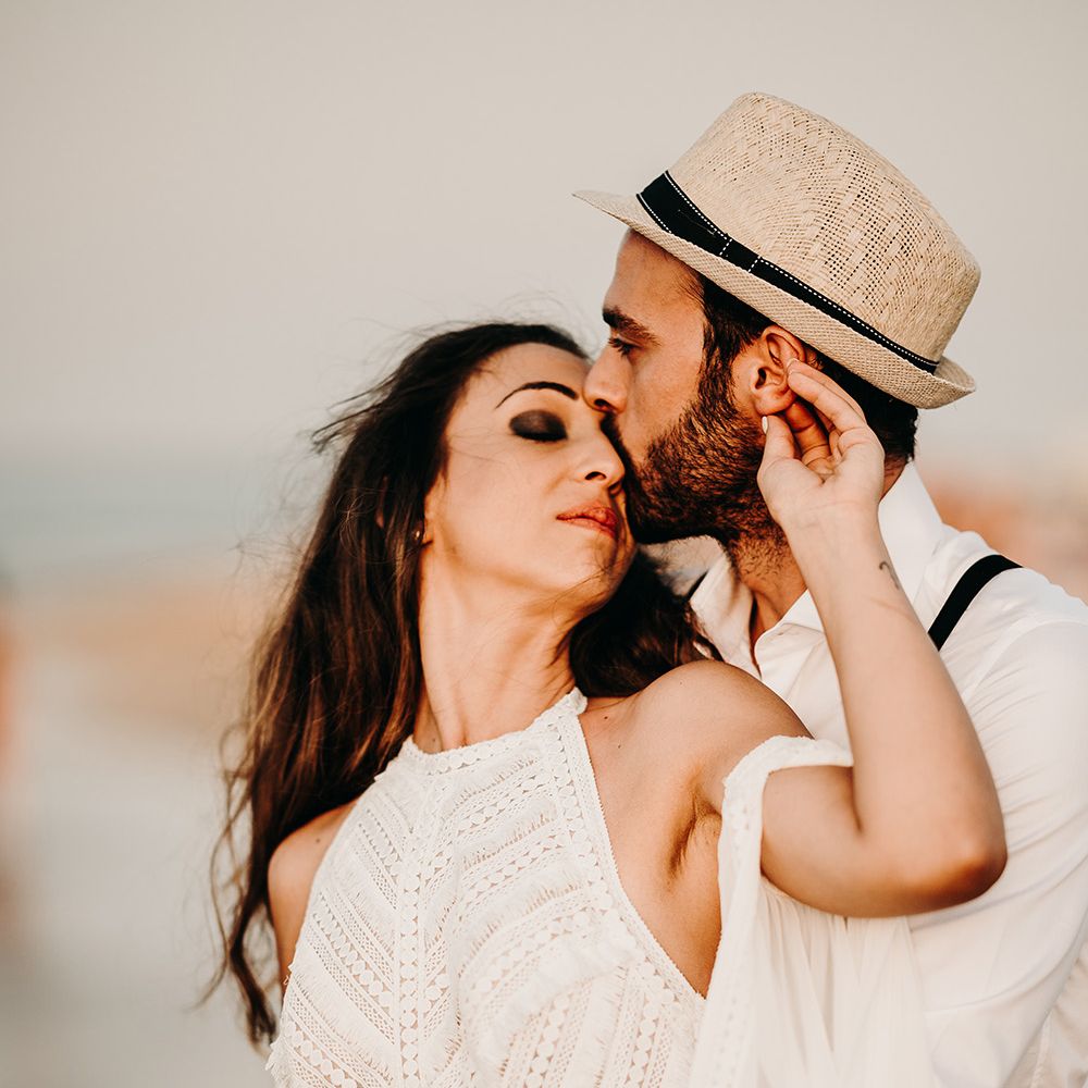 Bride and groom steal a kiss at Puglia wedding