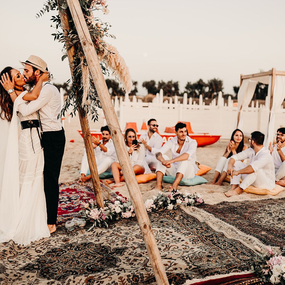 Beautiful ceremony decor at Italian beach wedding
