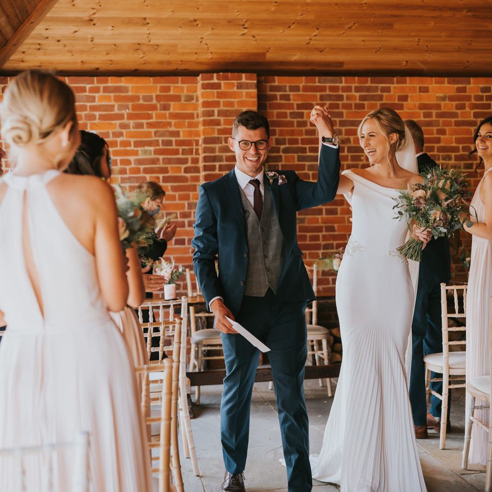 Bride & groom celebrate after marriage during wedding ceremony