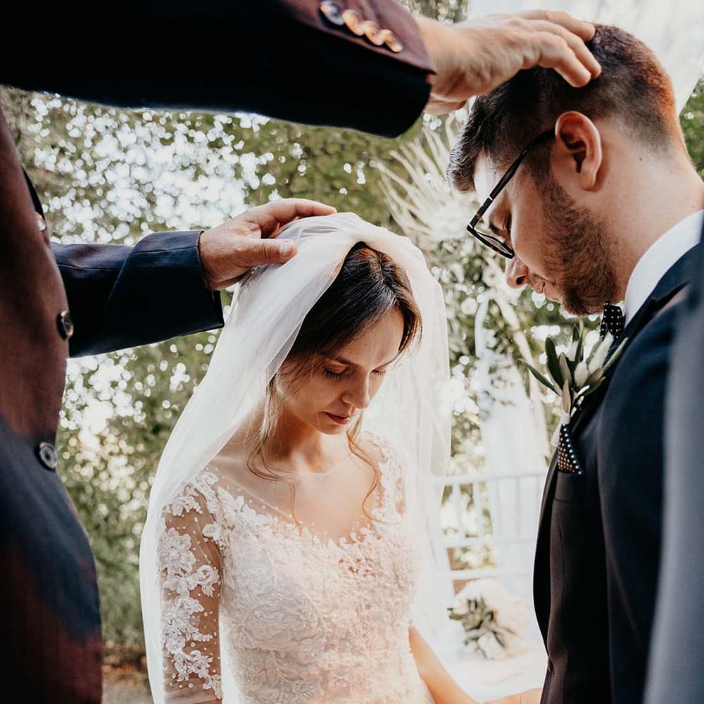 Bride during Christian Evangelic Ceremony wedding lace wedding veil  | Royal Studio