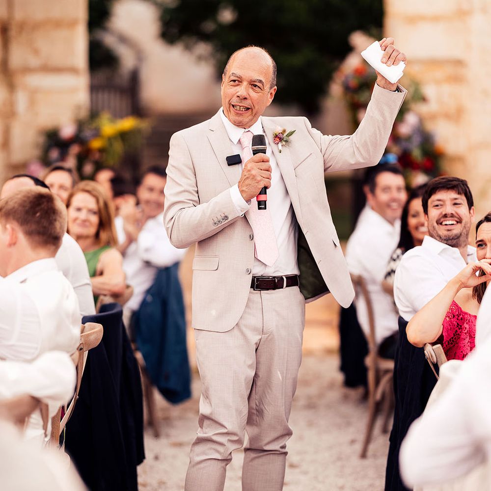 Wedding guest stands and delivers a wedding speech