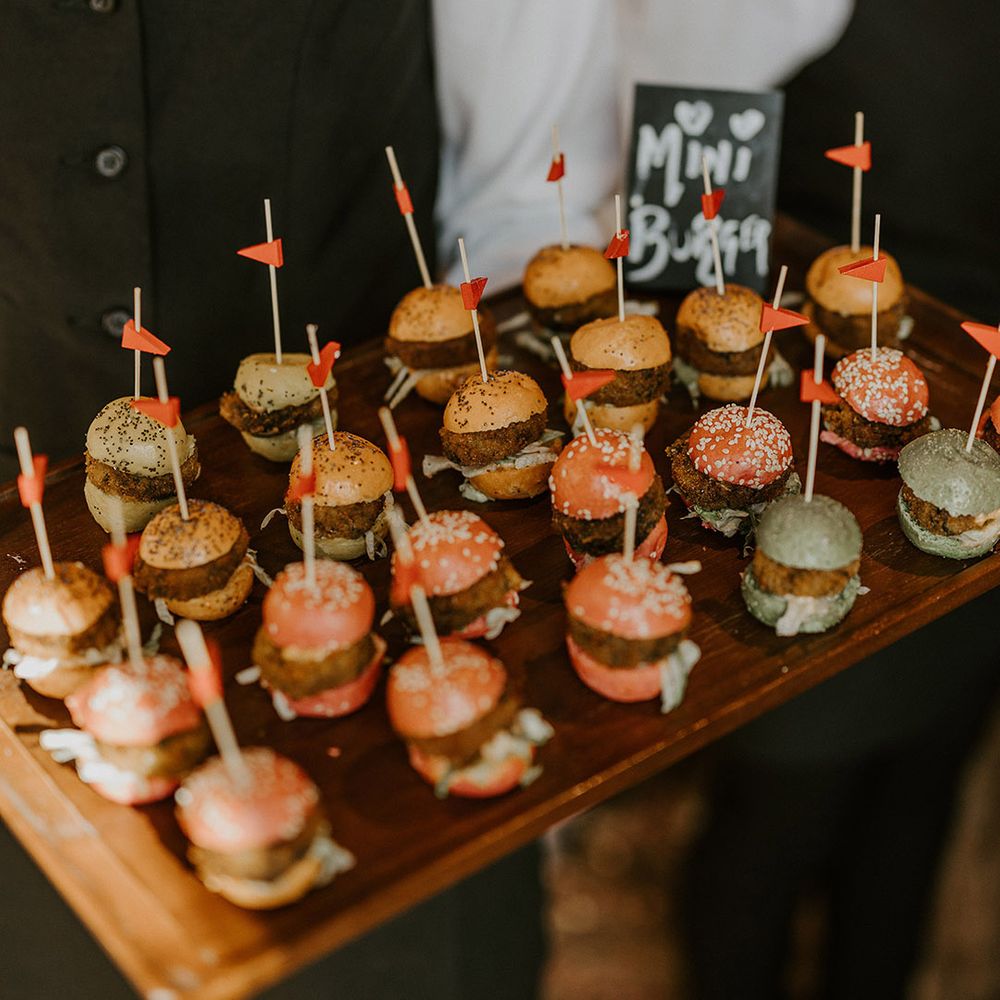 Mini sliders canapés for the wedding guests at multicultural wedding 