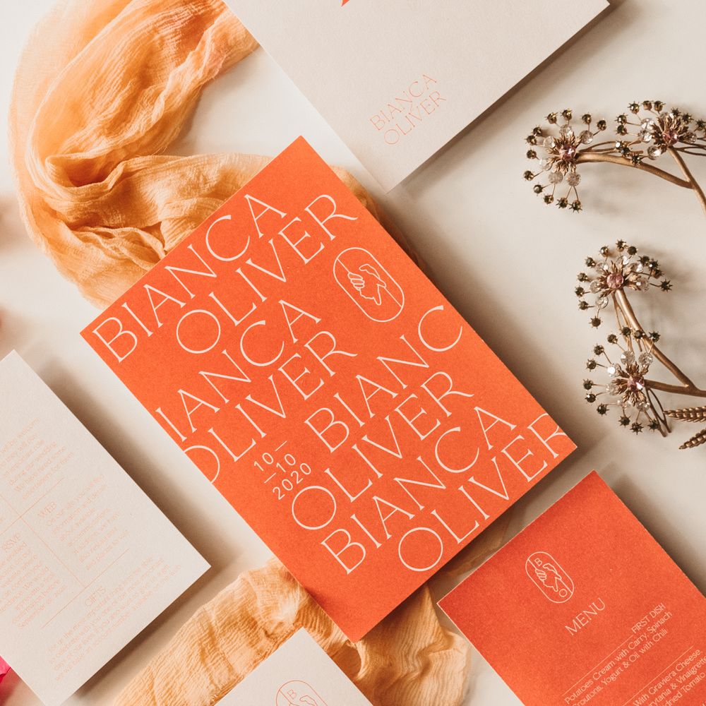 Orange & white wedding stationery in contemporary design