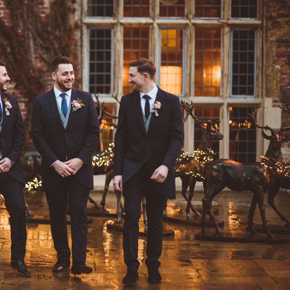 Groomsmen in traditional navy tails and grey waistcoat at Goldsborough Hall wedding 