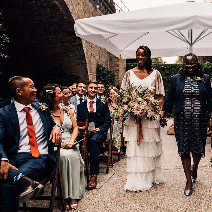 Mother of the bride walking her daughter down the aisle at 100 Barrington wedding ceremony