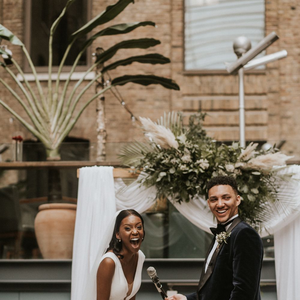 Devonshire Terrace Wedding in London with drapes, greenery and dried grasses 