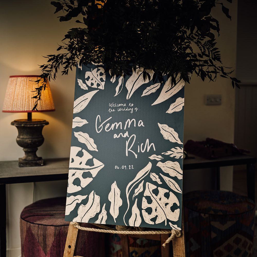 Green and gold wedding welcome sign with leaf design 