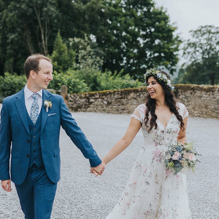 rustic barn wedding with bride in a Savin London Amelia dress