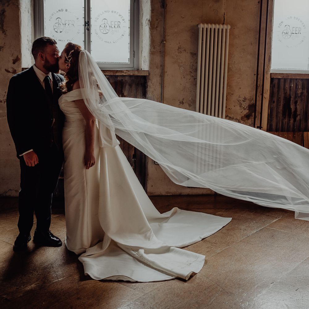 vintage wedding dress and cathedral length veil 