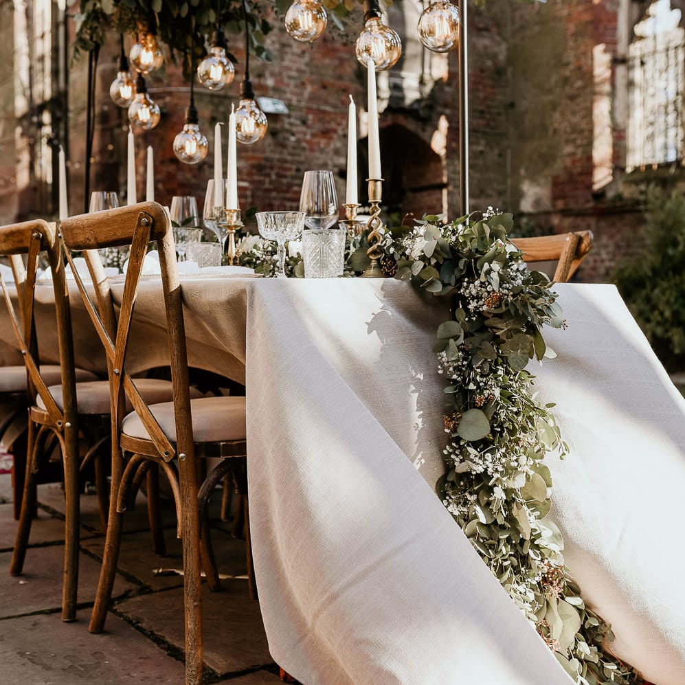 Linen table cloth and foliage table runner wedding reception table decor 