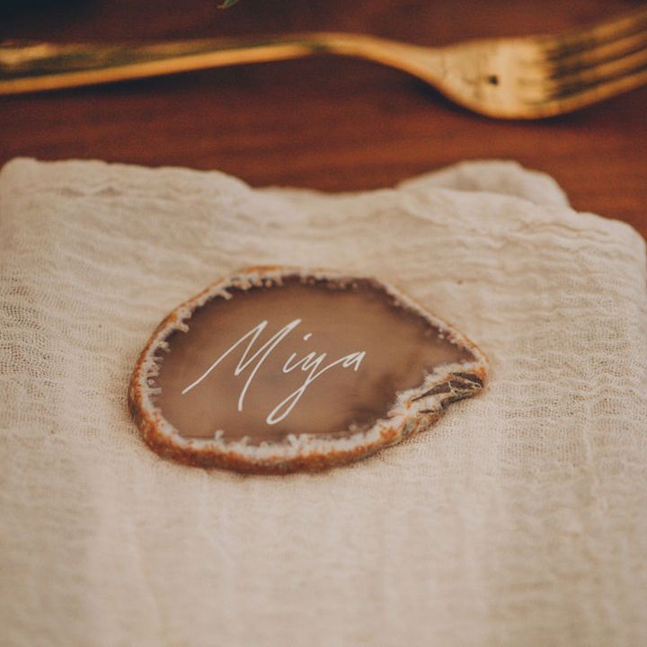 Personalised stone wedding place names with linen napkins