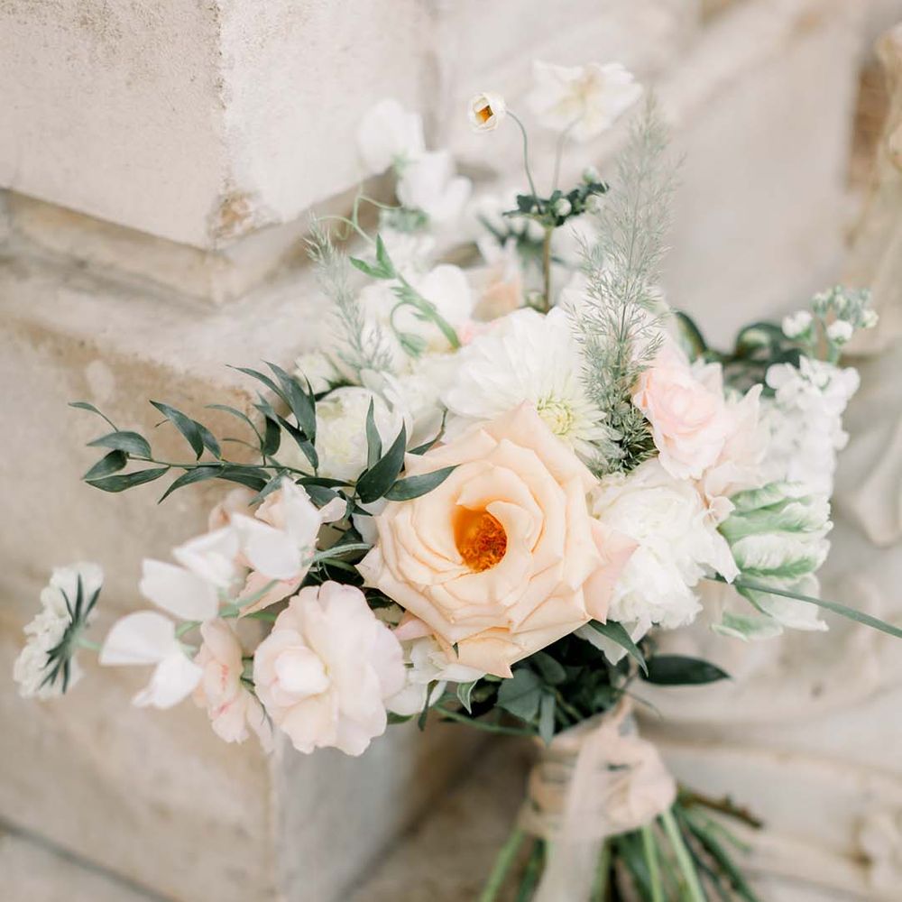 Pastel florals for wedding bouquet tied with ribbon
